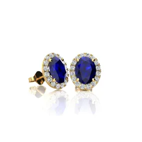 1 1/3 Carat Oval Shape Sapphire And Halo Diamond Stud Earrings In 14 Karat Yellow Gold